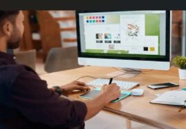 Website designer in Benin City working on a business website.