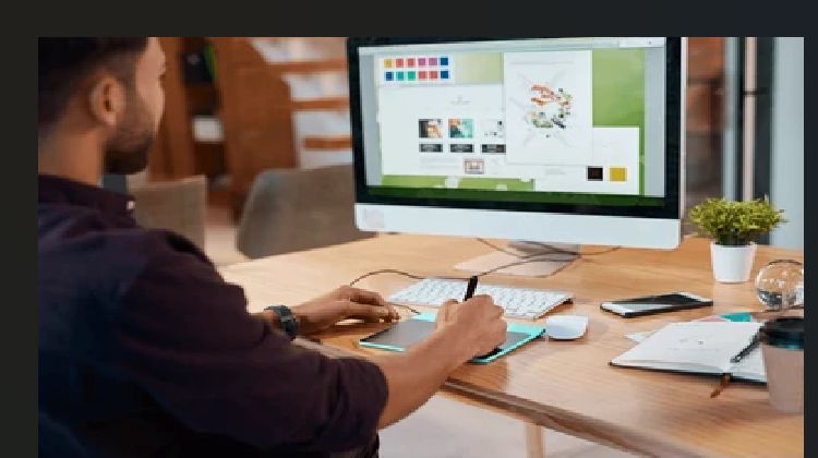 Website designer in Benin City working on a business website.